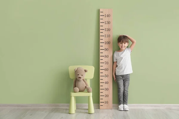 Little Boy Measuring Height Color Wall — Stock Photo, Image