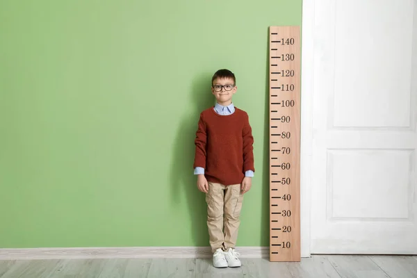 Little Boy Measuring Height Color Wall — Stock Photo, Image