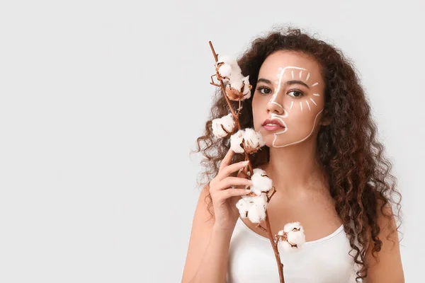 Beautiful Young African American Woman Paint Her Face Cotton Branch — Stock Photo, Image