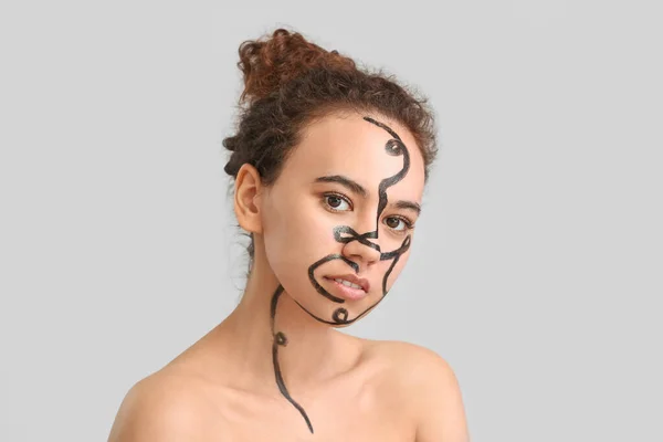 Beautiful Young African American Woman Paint Her Face Grey Background — Stock Photo, Image