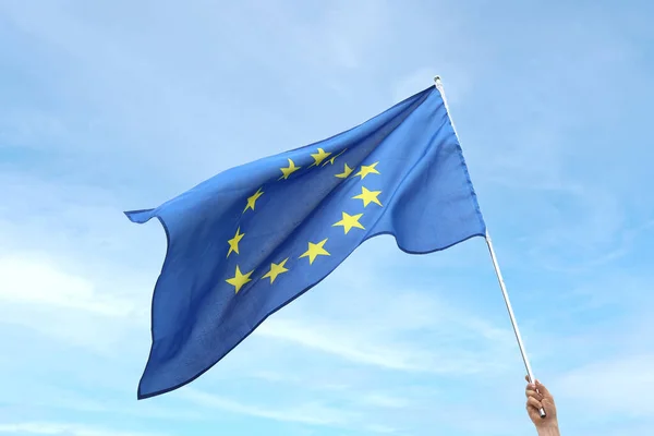 Hand Waving Flag European Union Light Background — Stock Photo, Image