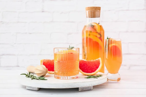 Glass Bottle Tasty Grapefruit Juice Light Background — Stock Photo, Image