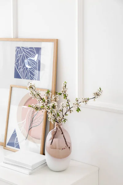 Vase Blossoming Branches Pictures Shelf Light Wall — Stock Photo, Image