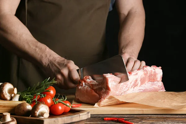 Man Cutting Raw Pork Ribs Wooden Table — Stock Photo, Image