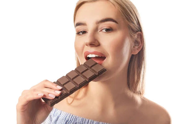 Beautiful Young Woman Eating Tasty Chocolate White Background — Stock Photo, Image