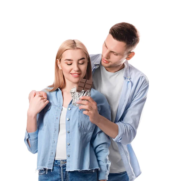 Young Couple Eating Tasty Chocolate White Background — Stock Photo, Image