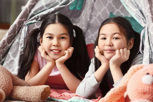 Cute Asian Sisters Lying Play Tent Home — Stock Photo, Image