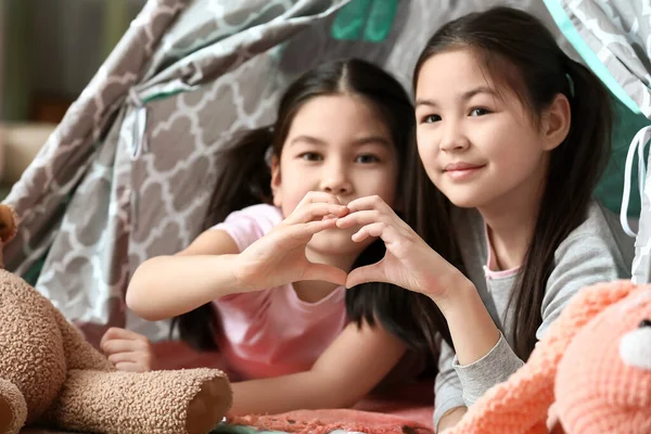 Cute Asian Sisters Making Heart Shape Hands Home — Stock Photo, Image