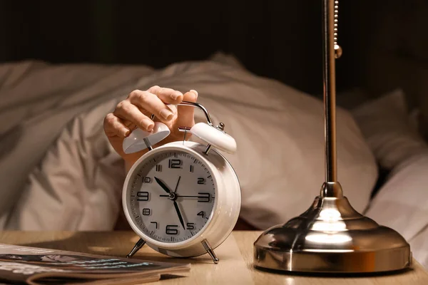Woman Turning Alarm Clock Bedroom Night Closeup — Stock Photo, Image