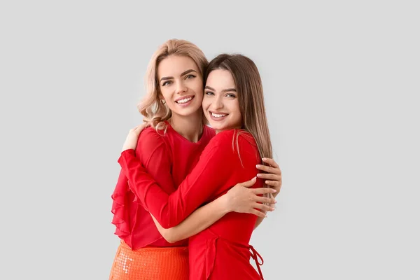 Beautiful Young Sisters Light Background — Stock Photo, Image