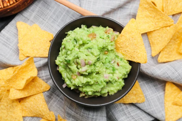 Bowl Tasty Guacamole Nachos Fabric Background — Stock Photo, Image