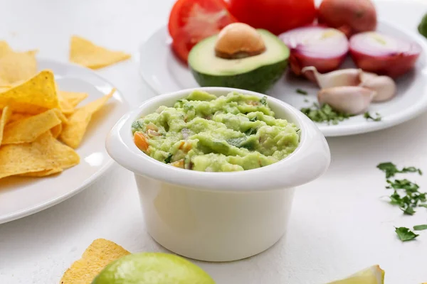 Bowl Tasty Guacamole Nachos Light Background Closeup — Stock Photo, Image