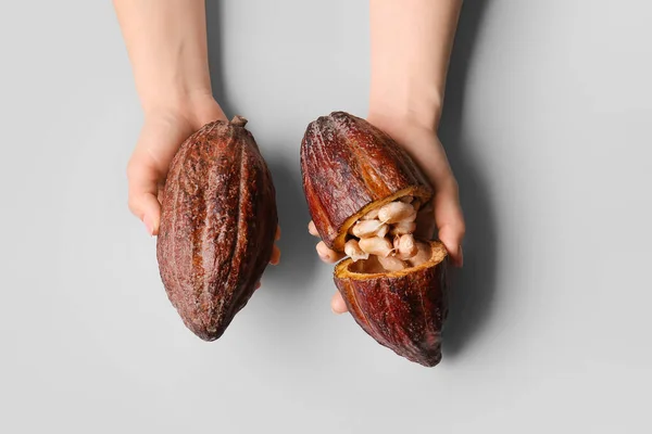 Woman Holding Fresh Cocoa Fruits Grey Background — Stock Photo, Image