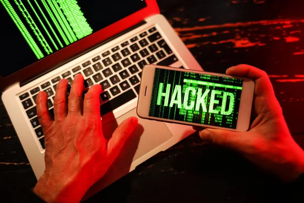 Hands Hacker Mobile Phone Laptop Dark Background — Stockfoto