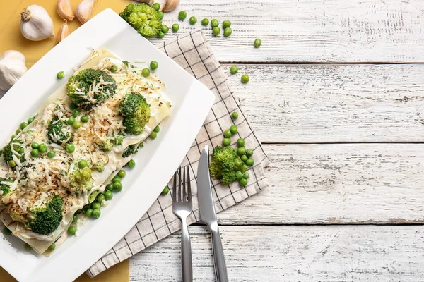 Plate Tasty Green Lasagna Ingredients Light Wooden Background — Photo