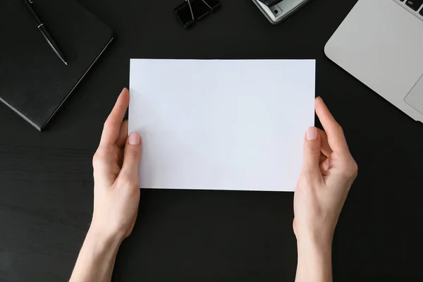 Woman Holding Blank Sheet Paper Dark Background — Stock Photo, Image
