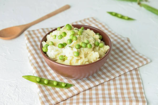 Bowl Mashed Potatoes Green Peas Spoon Light Background — Stock Photo, Image