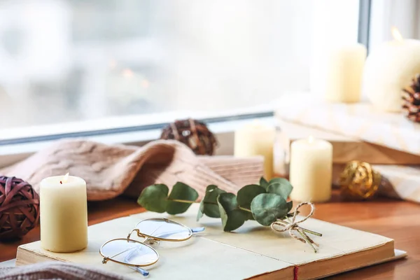 Book Plant Branches Eyeglasses Candle Windowsill — Stock Photo, Image