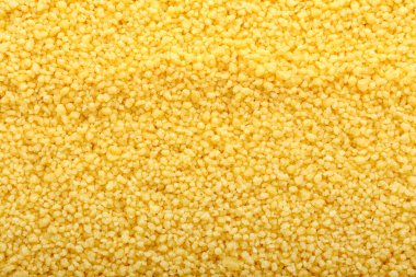 Tasty couscous as background, closeup