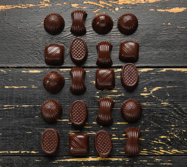 Sweet Chocolate Candies Dark Wooden Background — Stock Photo, Image