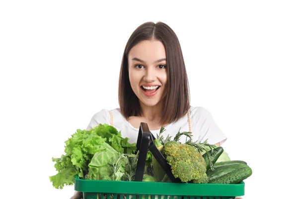 穿着白色背景的新鲜蔬菜的令人惊讶的年轻女子 — 图库照片