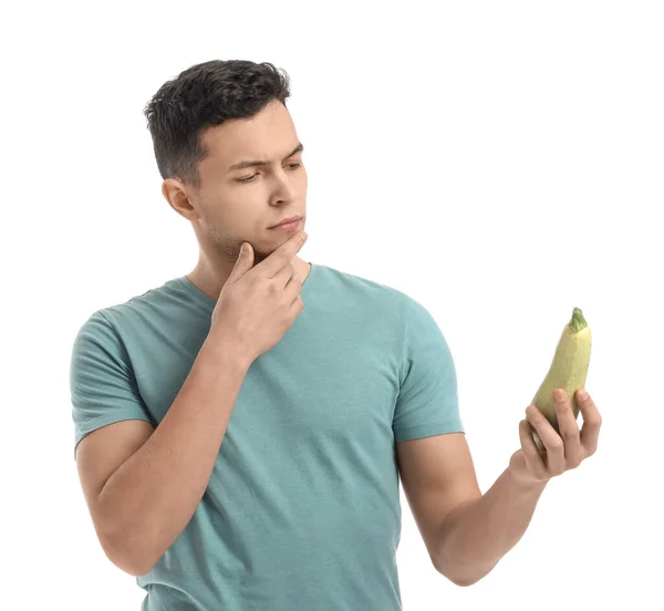 Thoughtful Young Man Fresh Zucchini White Background — Stock Photo, Image