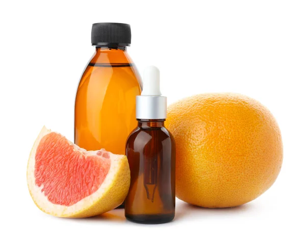 Bottles Essential Oil Grapefruits White Background — Stock Photo, Image