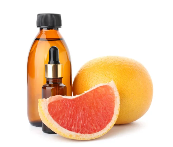 Bottles Essential Oil Grapefruits White Background — Stock Photo, Image
