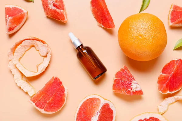 Composition Bottle Essential Oil Grapefruits Color Background — Stock Photo, Image