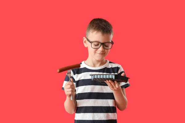 Little Boy Tasty Sausage Color Background — Stock Photo, Image