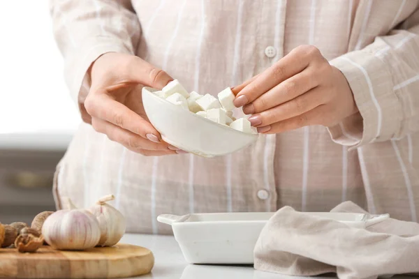 Woman Holding Bowl Pieces Feta Cheese Kitchen — Stock Photo, Image