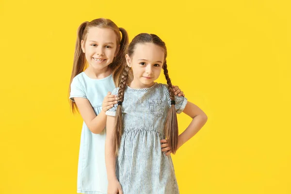 Cute Little Sisters Color Background — Stock Photo, Image