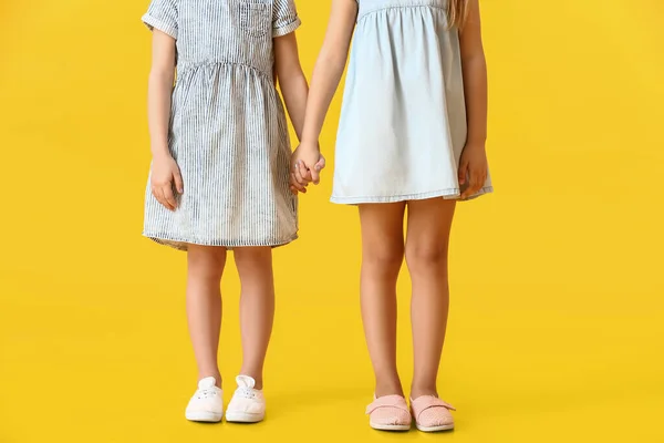 Cute Little Sisters Color Background — Stock Photo, Image