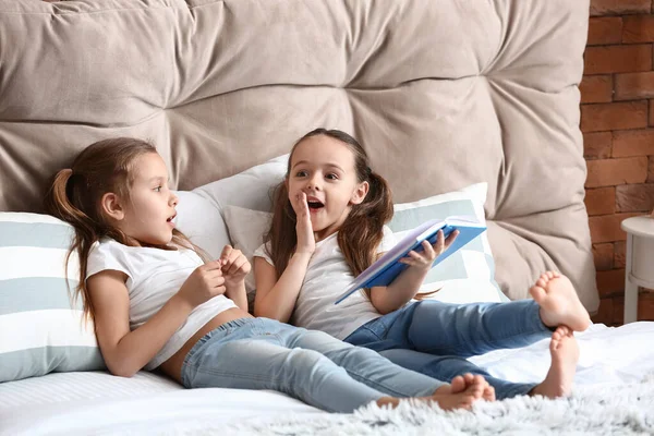 Cute Little Sisters Reading Book Bedroom — Stock Photo, Image