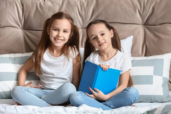 Cute Little Sisters Reading Book Bedroom — Stock Photo, Image