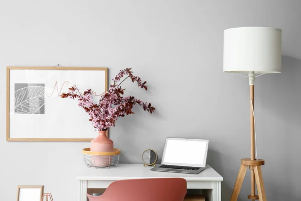 Stylish Workplace Vase Blossoming Branches Light Wall — Stock Photo, Image