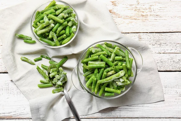 Bowls Frozen Green Beans Light Wooden Background — Stock Photo, Image