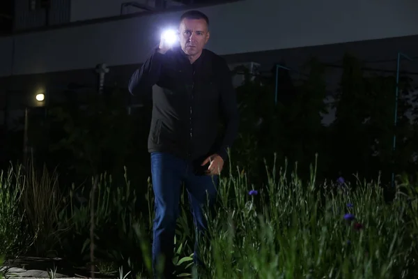 Senior Man Flashlight Outdoors Night — Stock Photo, Image