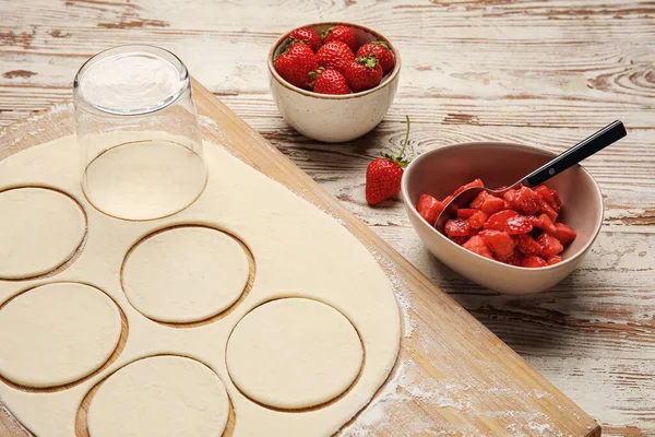 Composition Raw Dough Dumplings Strawberry Light Wooden Background — Stock Photo, Image