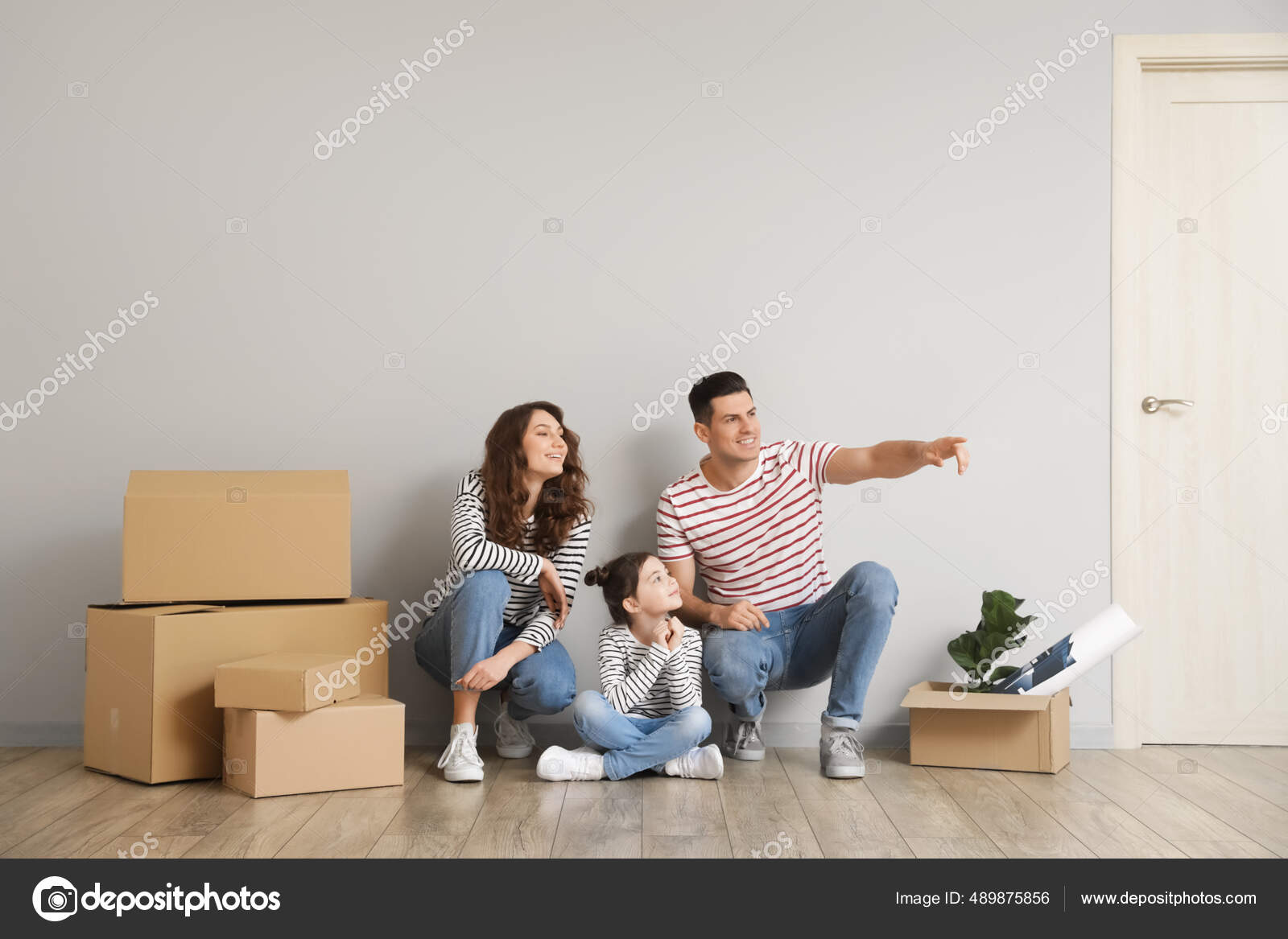 Happy Family Moving Boxes New House Stock Photo by ©serezniy 489875856
