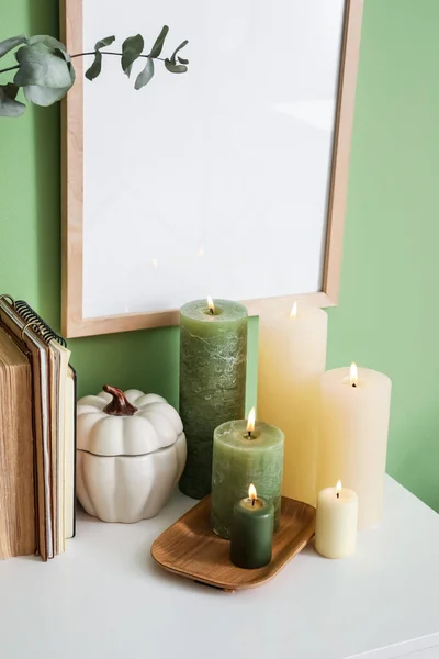 Burning Candles Blank Picture Frame Chest Drawers Color Wall — Stock Photo, Image