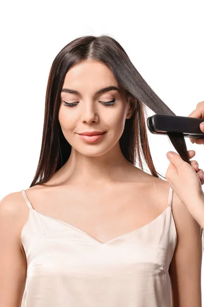 Straightening Young Woman Hair White Background — Φωτογραφία Αρχείου