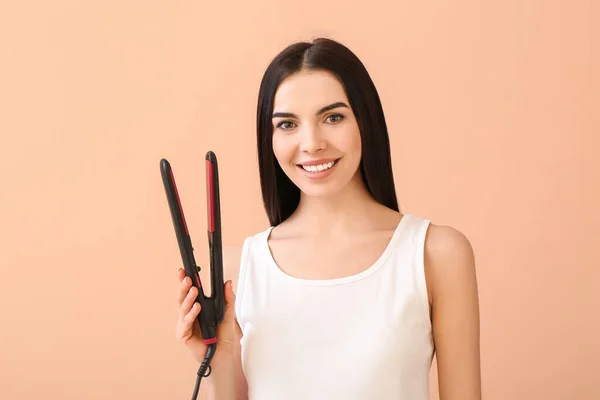 Beautiful Young Woman Flattening Iron Color Background — Stock Photo, Image