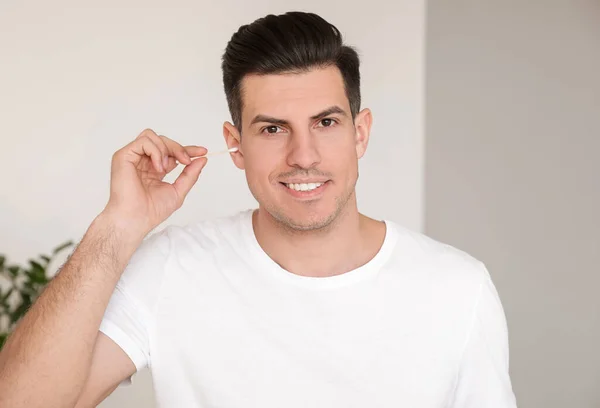 Young Man Cleaning Ears Cotton Bud Home — Stock Photo, Image