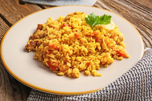 Plate Tasty Pilaf Wooden Background Closeup — Stock Photo, Image