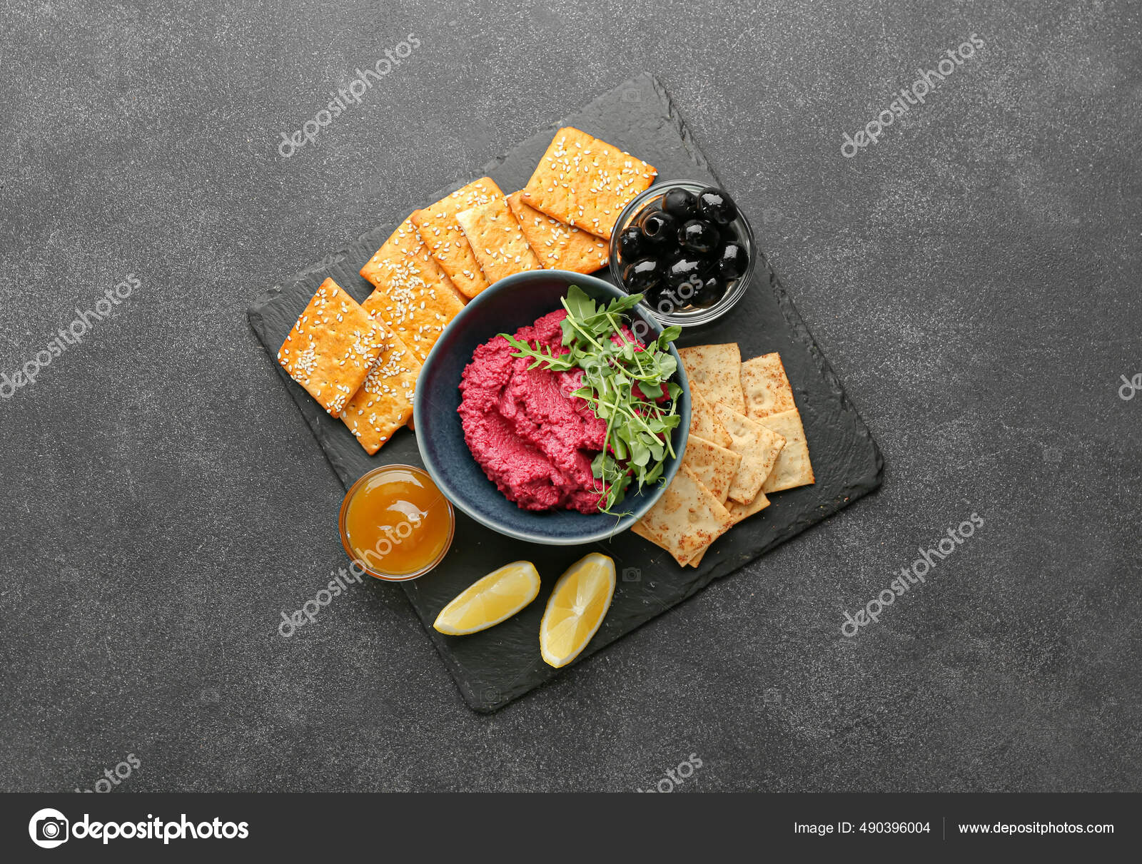 Composition Tasty Beet Hummus Crackers Olives Sauce Dark Background