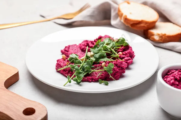 Plate Tasty Beet Hummus Fresh Sprouts Light Background — Stock Photo, Image