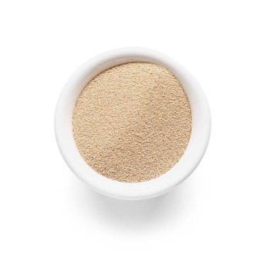 Beyaz arkaplanda etkin kuru maya olan bowling topu