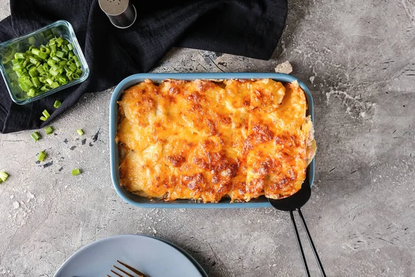 Baking Dish Tasty Potato Casserole Grunge Background — Stock Photo, Image