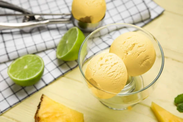 Glass Tasty Pineapple Ice Cream Lime Color Wooden Background Closeup — Stock Photo, Image